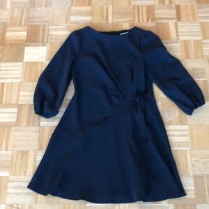 Shoshanna black long sleeve dress with bow detail. Worn once. Size 12.